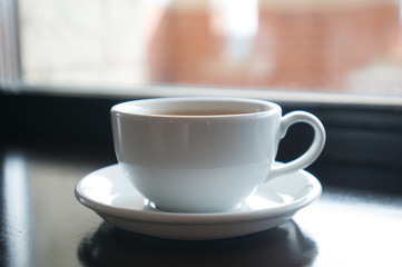 White cup with cappuccino