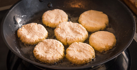 Pancakes are fried in a frying pan