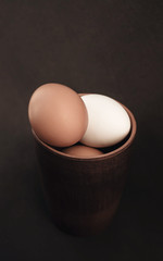 Basket with eggs and paper
