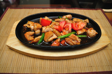 Chicken with tomatoes in a Chinese restaurant
