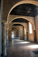 Fototapeta na wymiar medieval arched hallway with brick arches