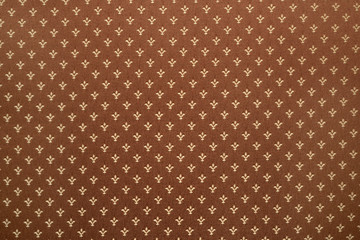 Royal lily or fleur-de-lis pattern on cloth © Yakov