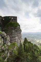 Fototapeta na wymiar Castle dedicated to goddess Venus, on Erice mountain. In the background the plain of the province of Trapani, Sicily, Italy