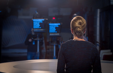 TV presenter is broadcasting live
