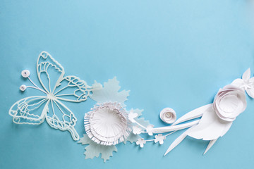 frame with white paper flowers