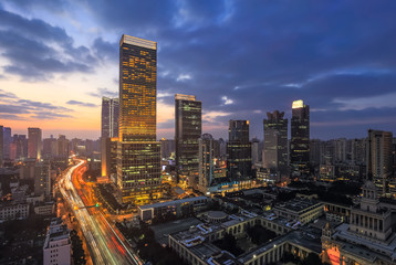 Naklejka na ściany i meble Aerial view of Shanghai cityscape and skyline at sunset