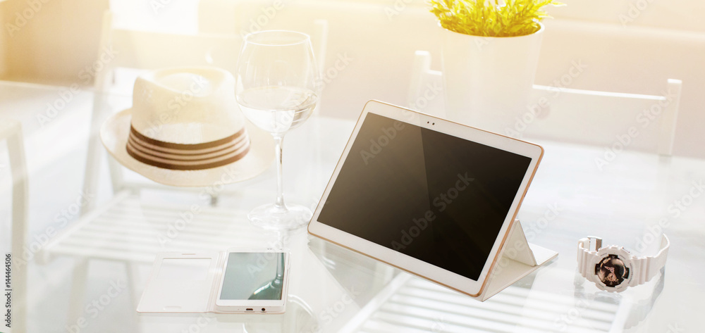 Wall mural workplace with digital tablet. responsive design