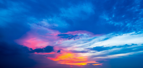 Naklejka na ściany i meble Sunset sky with clouds at twilight time