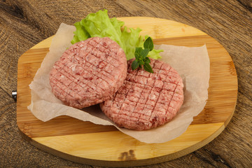Raw burger cutlet