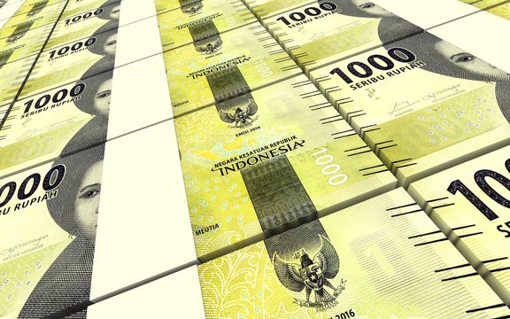 Indonesian rupiah bills stacks background. 3D illustration