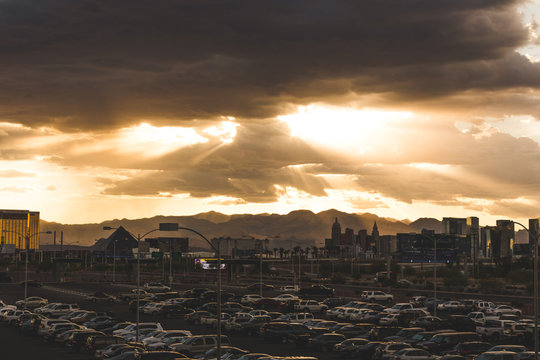 Sun Shining Through Clouds Over Las Vegas Skyline