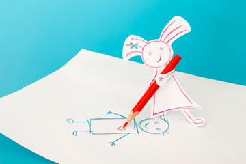 Paper girl draws a boy. Find own love concept. Child creativity