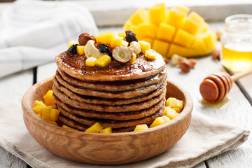 Vegan pancake with mango