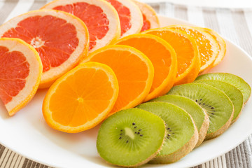 Fresh cutting fruits / vitamins concept.