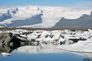 Fototapeta na wymiar Icebergs floating in Jokulsarlon glacier lake, Iceland