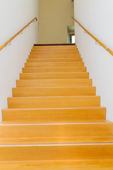 Wooden staircase in modern house interior