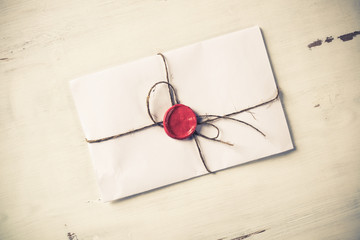 Letter with seal on table