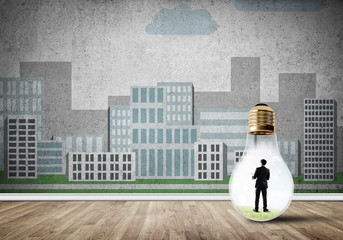 Businessman trapped in bulb