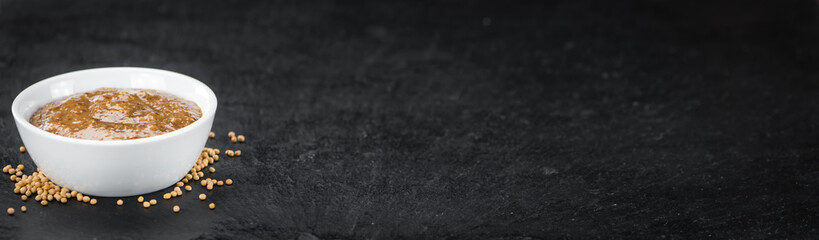 Some Mustard (sweet) on a dark slate slab