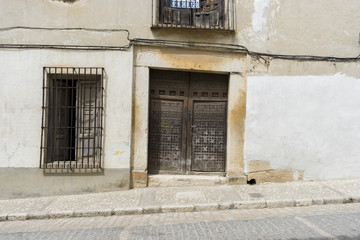 Fototapeta na wymiar Chinchon, Spanish municipality famous for its old medieval square of green color, old wooden doors