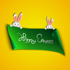 Happy easter. Green ribbon in the form of a banner. Place for your projects. Peeping white rabbits on an orange background. Text on the ribbon. 3d, realistic