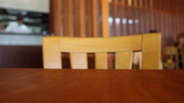 Table at restaurant blurred background