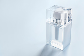 Bottle of modern male perfume on white background