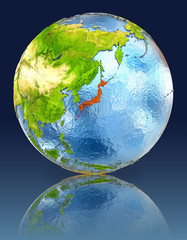 Japan on globe with reflection