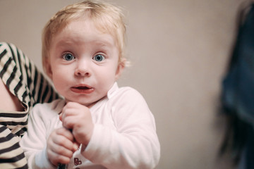 beautiful little girl is very surprised