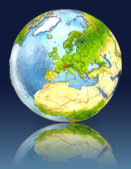 Obraz na płótnie Canvas Switzerland on globe with reflection
