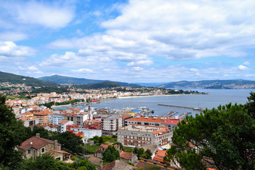 View over the town of Cangas on the Bay of Vigo, Spain - obrazy, fototapety, plakaty