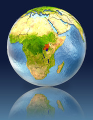 Uganda on globe with reflection