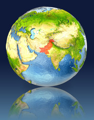 Pakistan on globe with reflection