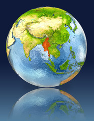 Myanmar on globe with reflection