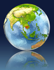 Cambodia on globe with reflection