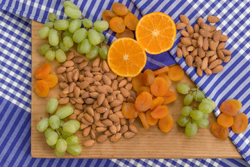 Healthy raw fruit and nut snack platter