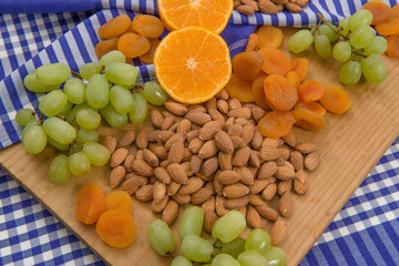 Healthy raw fruit and nut snack platter