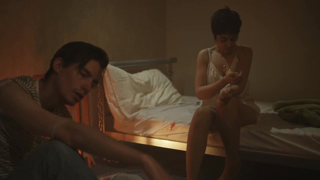  Drug addict couple in gloomy apartment injecting drugs & passing out