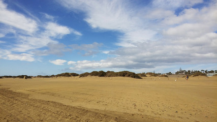 Fototapeta na wymiar Beautiful sand dune in sunshine day at Maspalomas, Spain