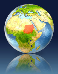 Sudan on globe with reflection