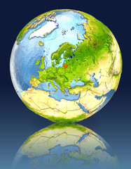 Lithuania on globe with reflection