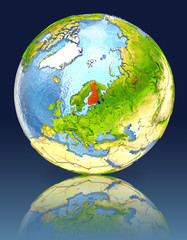 Finland on globe with reflection