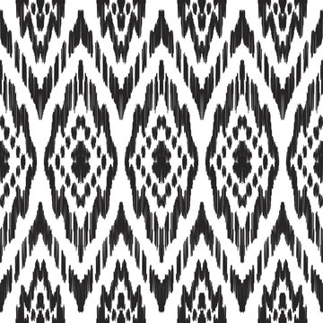 Vector Ikat seamless pattern. Navajo, aztec ornament. Creative hippies print. Abstract background. American ethnic backdrop.
