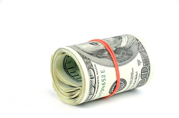 roll of hundred USA dollar bills with red rubber