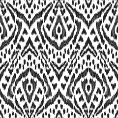 Vector Ikat seamless pattern. Bohemian ornament. Creative hippies print. Stylish ethnic backdrop. Boho chic style. Hipster design.