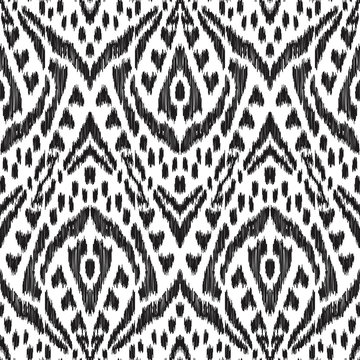 Vector Ikat seamless pattern. Bohemian ornament. Creative hippies print. Stylish ethnic backdrop. Boho chic style. Hipster design.