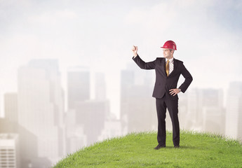 man standing in front of city landscape