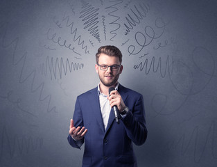 Businessman holding microphone