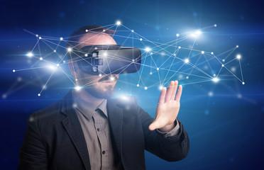 Businessman with virtual reality goggles
