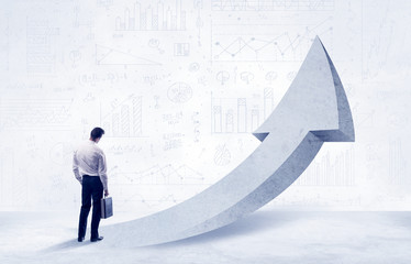 Obraz premium Financial businessman with arrow concept